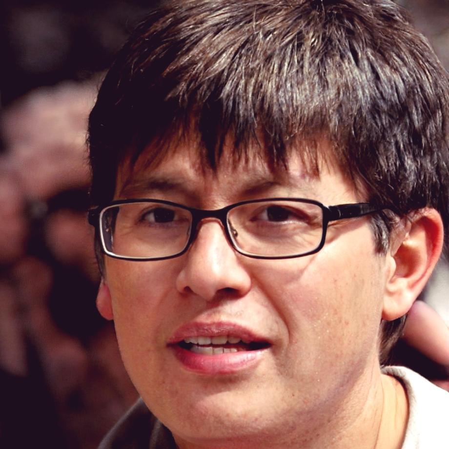 Lachlan Finnerty reviewing business communication materials at desk